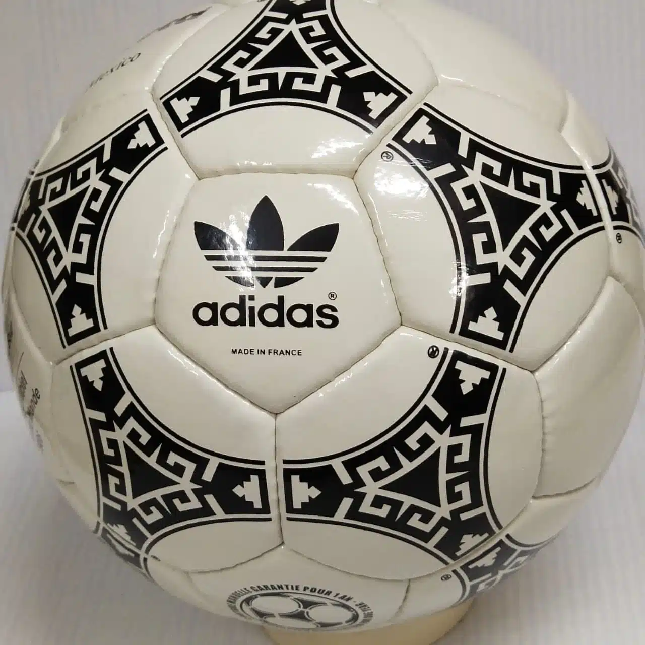 Adidas Azteca 1986 Adidas Azteca Mexico 1986 soccer ball with black Aztec patterns on white leather.