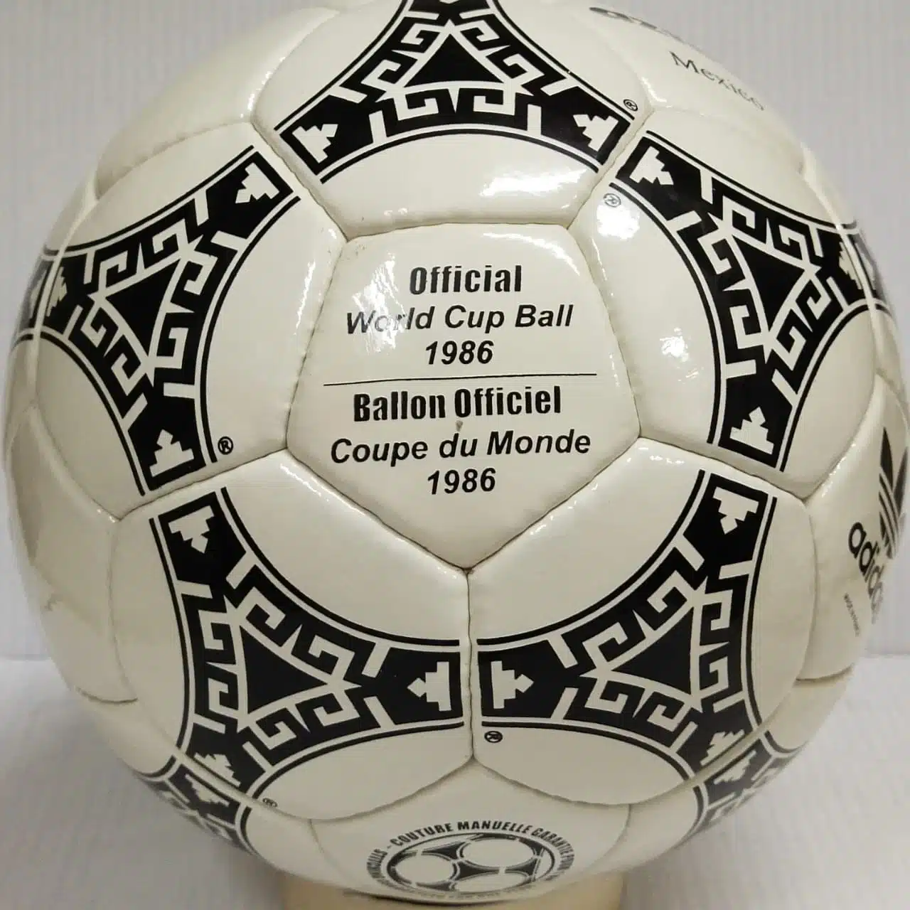 Adidas Azteca 1986 Adidas Azteca Mexico 1986 soccer ball with black Aztec patterns on white leather.