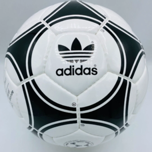 Adidas Tango España 1982 World Cup soccer ball replica with black triad pattern.